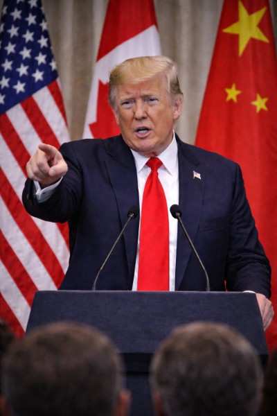 Trump threatens Canada with 100% tariffs